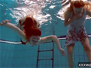 molten Russian dolls swimming in the pool