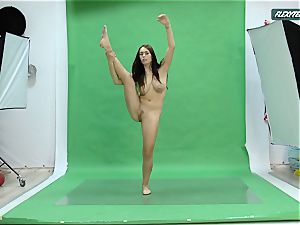 meaty udders Nicole on the green screen stretching