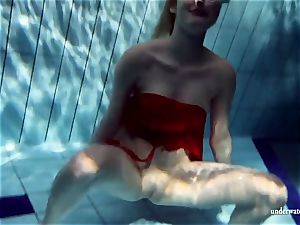 sizzling light-haired Lucie French teenager in the pool